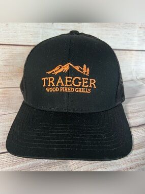 NWOT TRAEGER TRUCKER HAT, BLACK WITH ORANGE WRITING